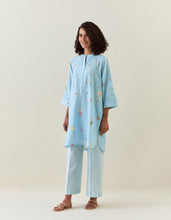 Blue botanical print mid length cotton linen kurta with yoke placket
