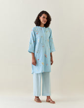 Blue botanical print mid length cotton linen kurta with yoke placket