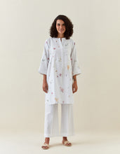 White botanical print mid length cotton linen kurta with yoke placket