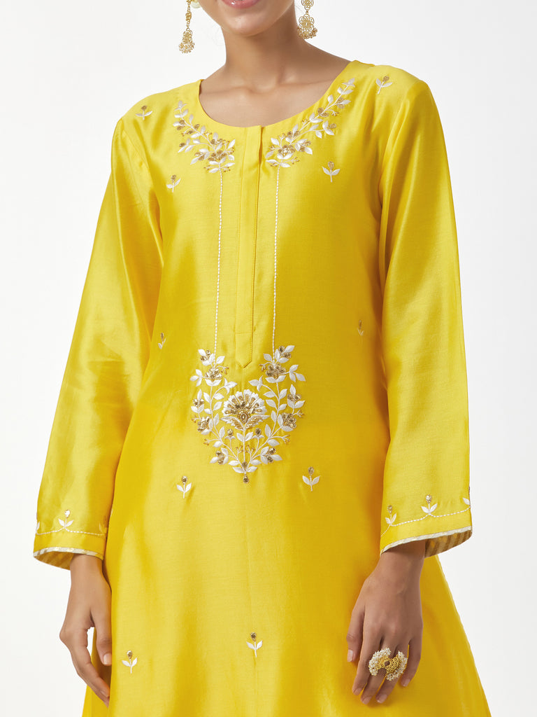 Olive Yellow Silk Chanderi paneled kurta set with all-over small Pink & Yellow flower hand block print.