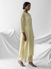 Pastel yellow dobby kurta with embroidered yoke