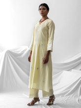 Pastel yellow dobby kurta with all over embroidery