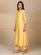 Yellow hand embroidered silk chanderi kurta