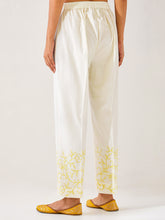 Off White  palazzo with embroidered hem