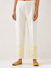 Off White  palazzo with embroidered hem