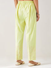 Yellow palazzo with embroidered hem