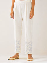 Off White  palazzo with embroidered hem