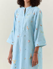 Blue botanical print mid length cotton linen kurta with yoke placket