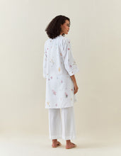 White botanical print mid length cotton linen kurta with yoke placket