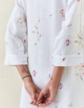 White botanical print mid length cotton linen kurta with yoke placket