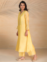 Yellow hand embroidered silk chanderi kurta